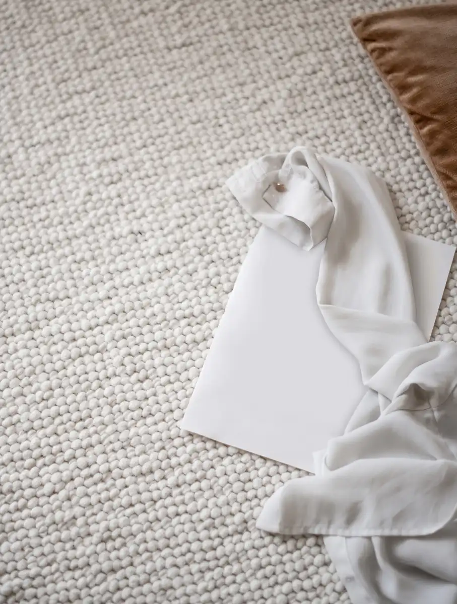 Blouse on top of paper guides on floor