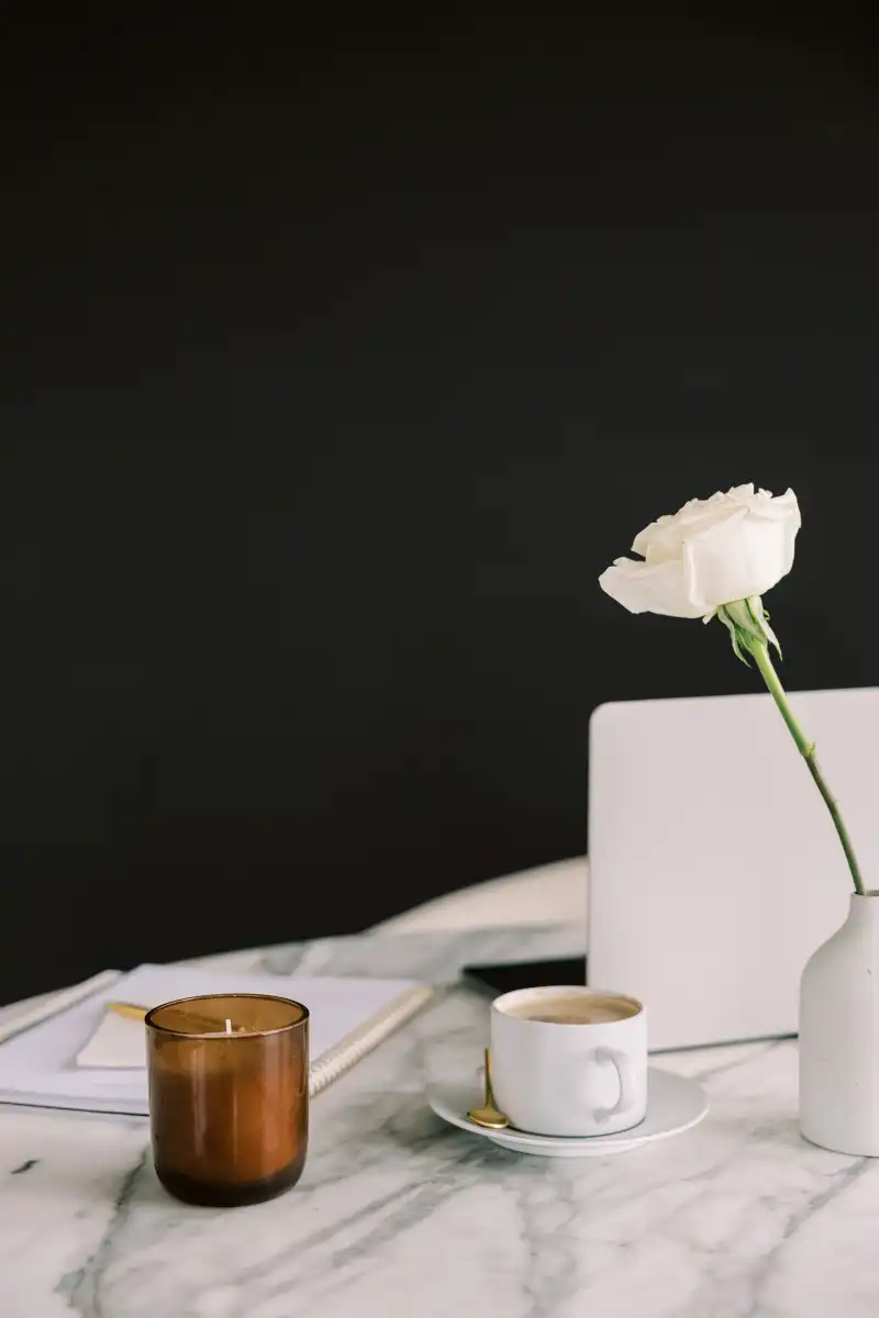 A feminine workspace with a black background for bold, dramatic attention